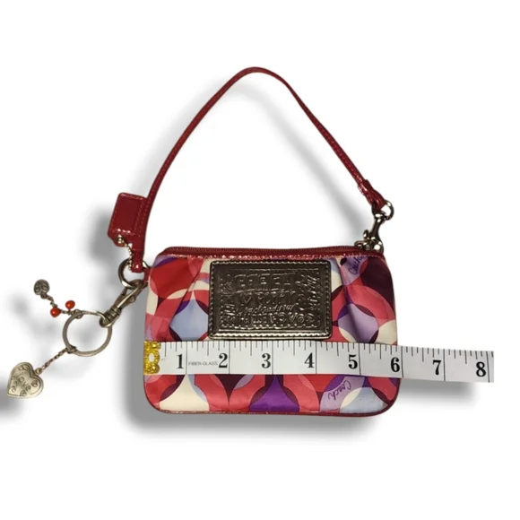 Coach Wristlet with charms, like NEW!! - Picture 8 of 8